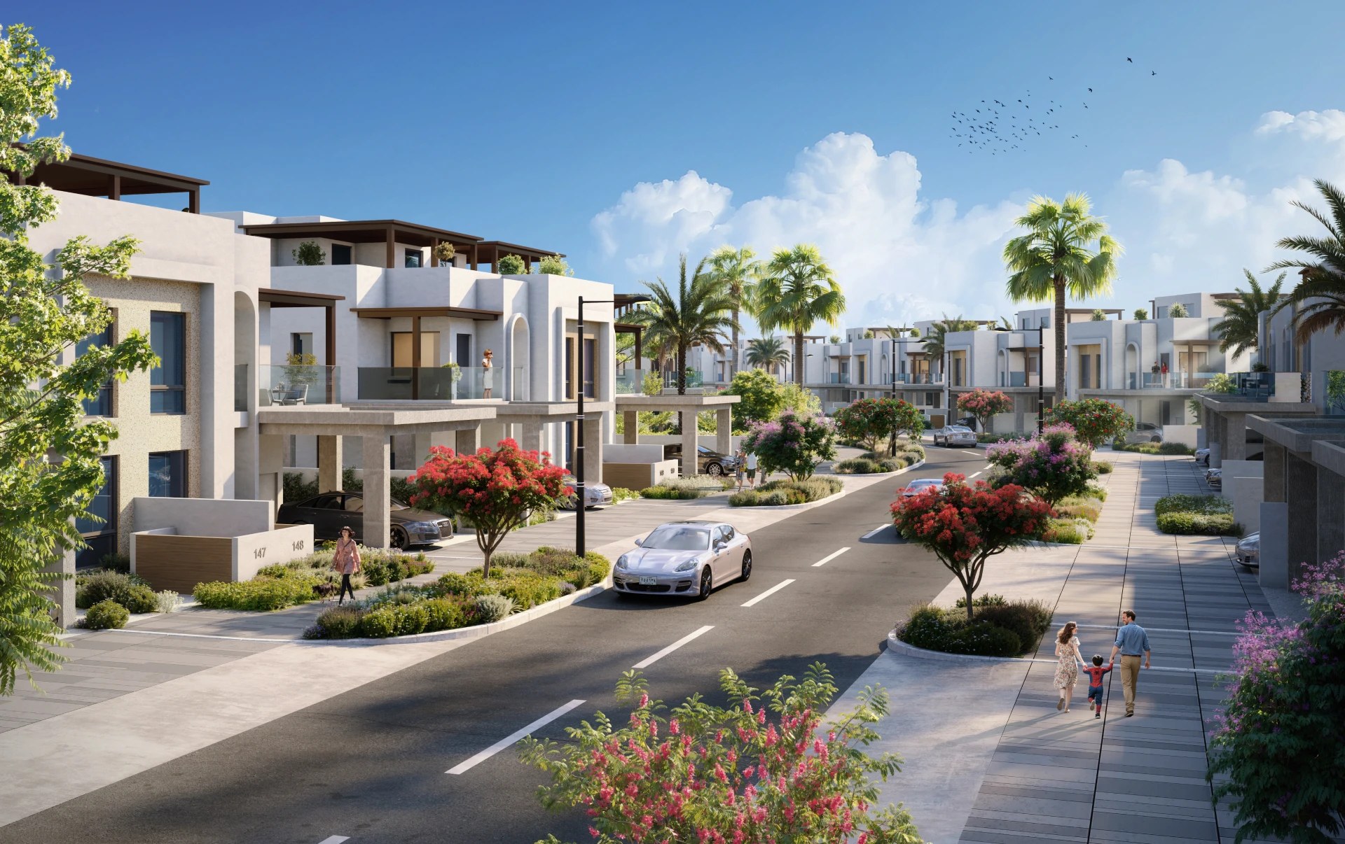 Il viale interno di Hayat con le townhouse e i giardini fioriti, render ufficiale