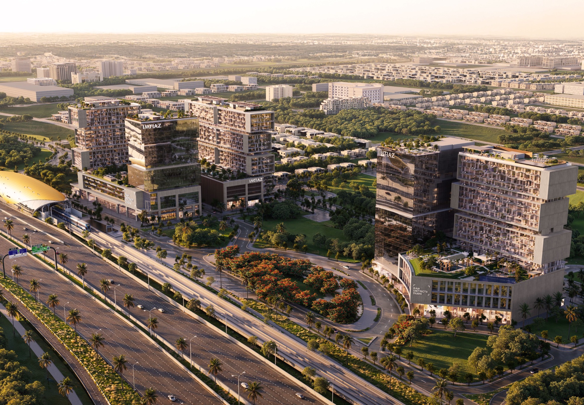 Vista aerea del district al tramonto con Sheikh Zayed Road e il Flame Tree Park